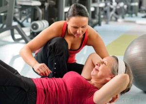 woman-working-out-with-trainer